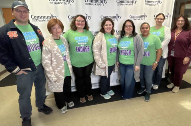 SSA members in One Job Should Be Enough shirts at the District 99 Board of Education meeting.
